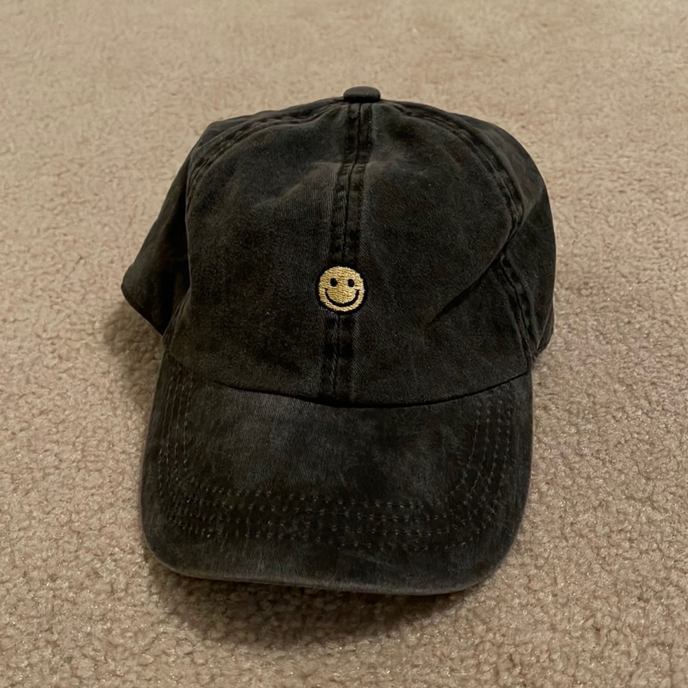 smiley face faded hat